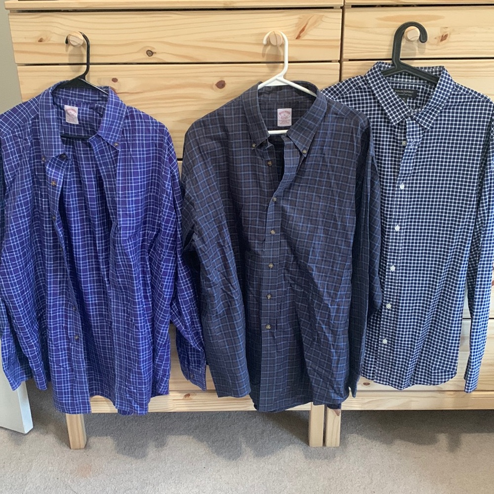 Three men’s dress shirts